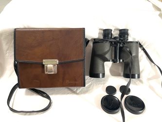 Great condition antique Bushnell Insta focus binoculars with case and lens caps