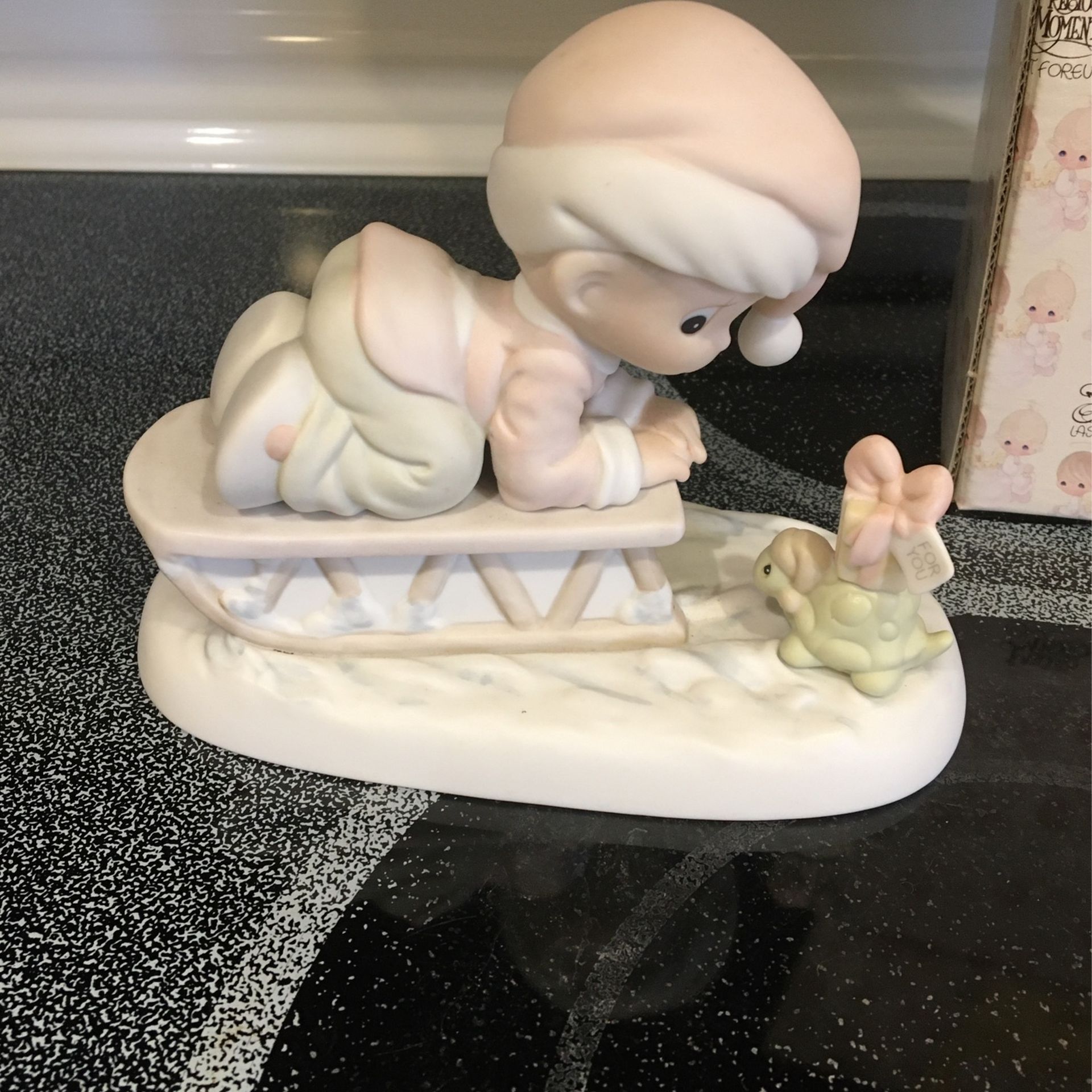 Precious moments bringing you a merry Christmas