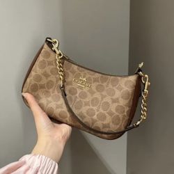 Coach Brown Logo Shoulder Bag with Gold Hardware and Leather Strap