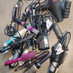 Curly Iron, Flat Iron And Hair Brush.