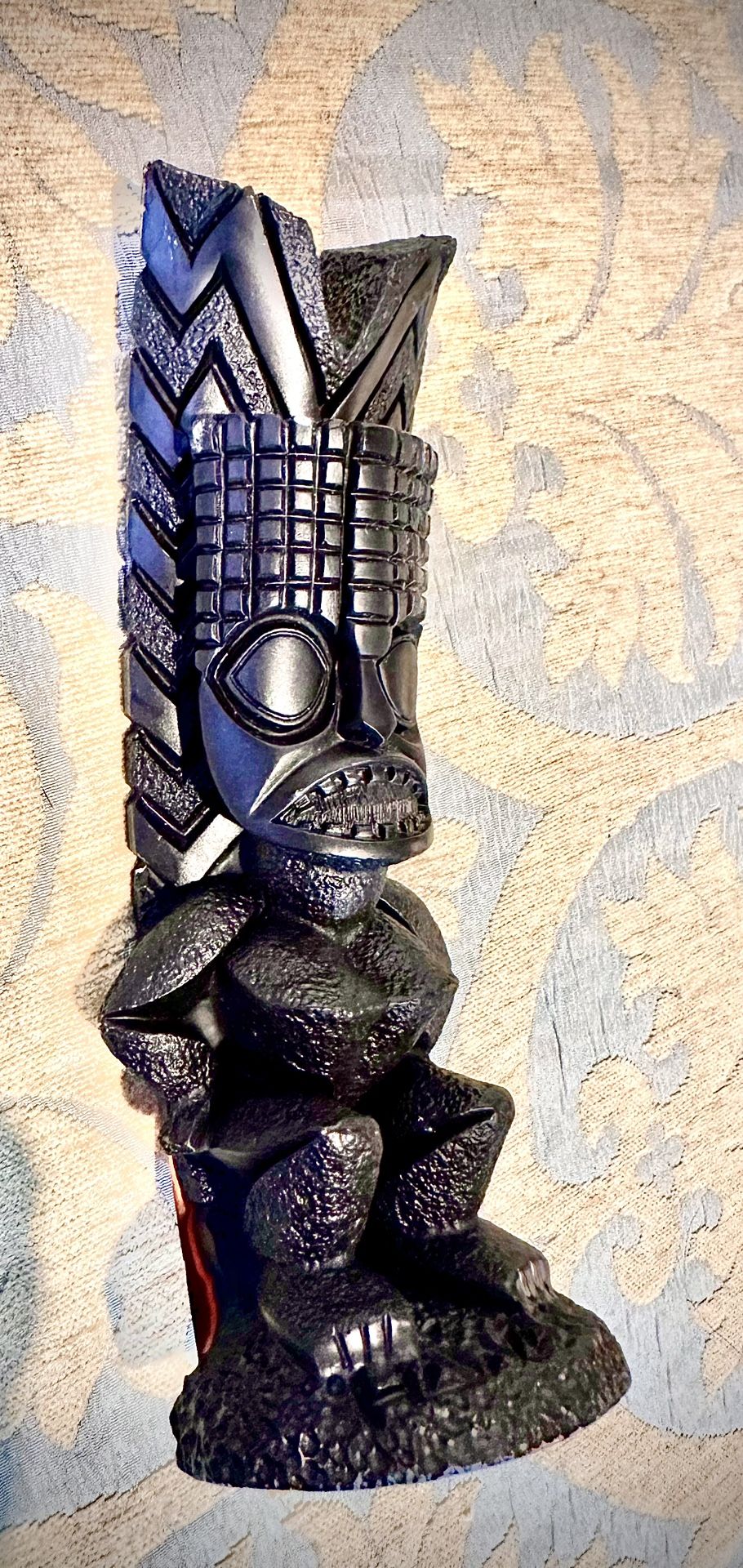 Hawaiian Lava Wood Sculptures Kanaloa Tiki God of Eternal Hope with dimensions H8xL2xD2.5 inch Lbs 0.5. This is an original Hawaii art item carved in