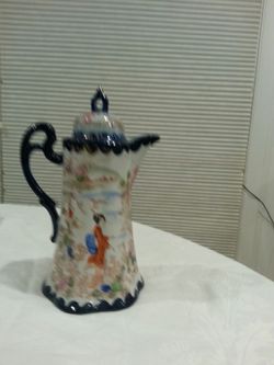 Tea or coffee pot..oriental scene