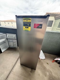 Deep freezer about 5 ft tall