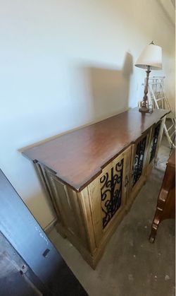 Long French-country sideboard / buffet, dark wood top, iron scroll doors — $225