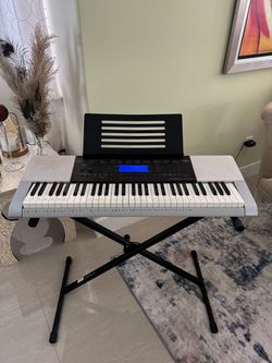 Teclado Casio CTK-4200 de 61 teclas+ Soporte