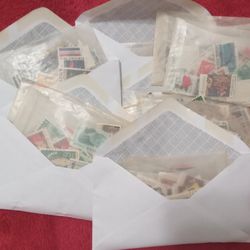 SPECIAL OFFER /Approximately 200 envelopes with stamps from around the world