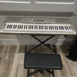 Casio WK-200 76-Key Keyboard w/ Power Supply stand and seat (IF THE ADD IS UP, IT’S AVAILABLE)