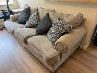 Gray sofa with pillows