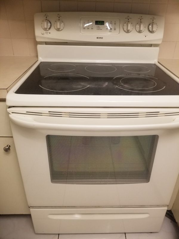 Kenmore Electric Stove with flat glass top with Over the range