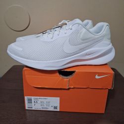 Nike Revolution White
Womens Size 8.5, Mens 7
