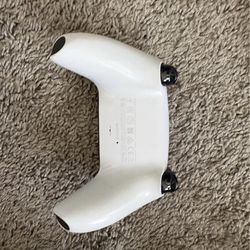 Playstation 5 Console and 2 Controllers and a charging dock.