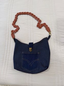 Hand made Denim purse with brown leather chain strap.