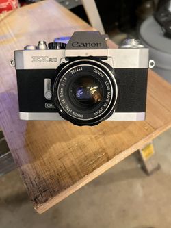 Two Cameras , A Canon Ex Auto & A Olympus 35 R C