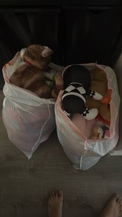 2 bags full of toys and plush