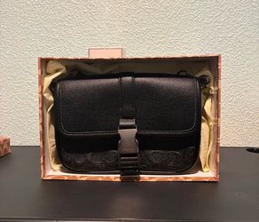 Co*ch crossbody bag