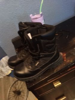 Brand new work boots brand new hard hat and brand new vest and long sleeve cat 2