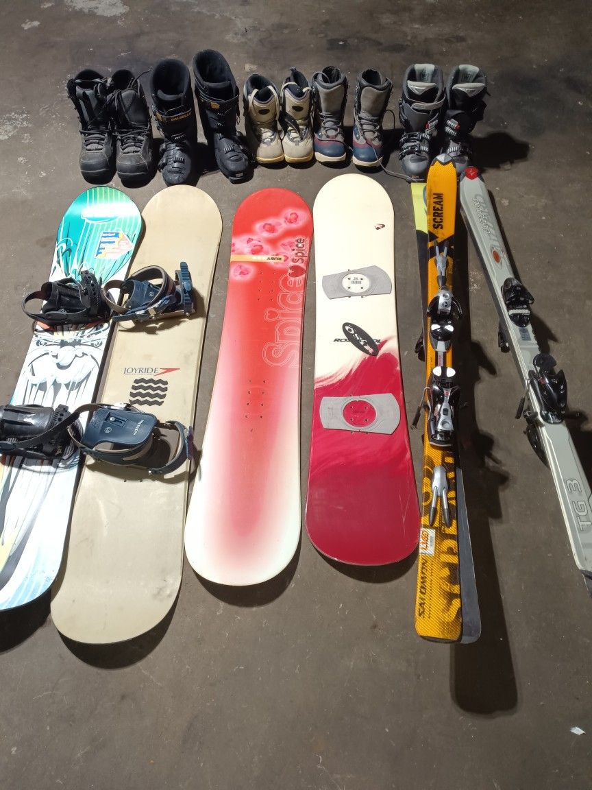 Skis And Snowboards 2 Pairs Of Ski Boots And 3 Pairs Of Snowboard Boots