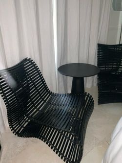 Black chairs and sidetable