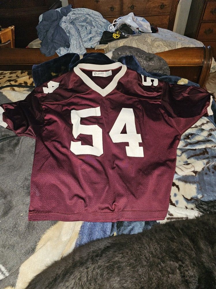 Pro wrestler John Cena's. ORIGINAL COLLEGE FOOTBALL JERSEY
