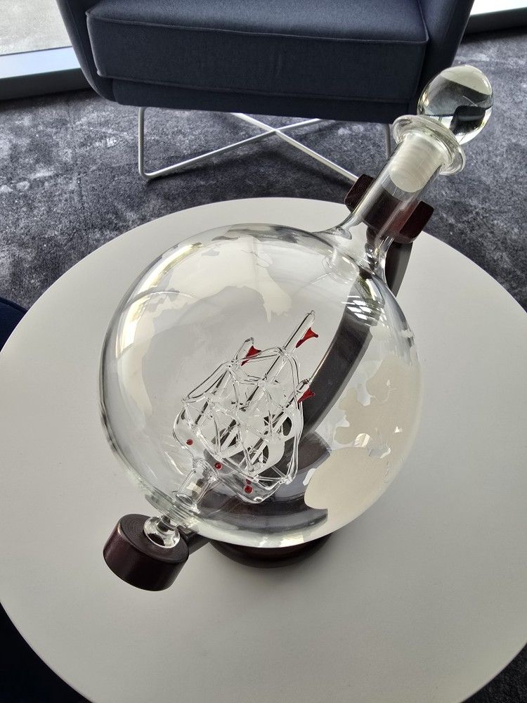 Glass Ship In World Globe On Stand.