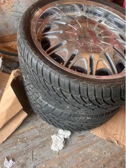 Nice 22 inch player rims three tires are in fair shape. One tire is bald bolt pattern is 5 x 1 15 and 5 x 20 pick up Milwaukee area.