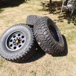 Tires And Wheels. 8 Lug Chevy Two Of Them Have At Least 60% Two Of Them Not So Good. All Four $300 Firm Ad Will Stay Up Until They're Sold