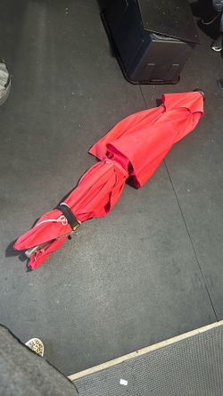Red Outdoor Umbrella With Solar Lights $80.