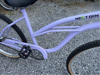 NextGen Single-Speed Women’s Cruiser Bike, steel frame, classic upright pedal-forward geometry, padded spring saddle, wide handlebars, & balloon tires