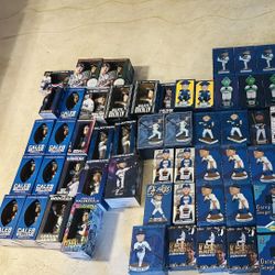 Dodger and Quakes bobbleheads for sell for pricing not zero dollars