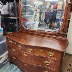 Antique dresser with mirror.  54L x 25D x 32.5H w/ mirror 68H