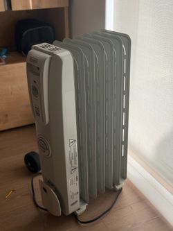 De'Longhi Oil filled Radiator Heater, 1500W Electric Space Heater for indoor use, portable room heater, Energy Saving, full room like office and bedro