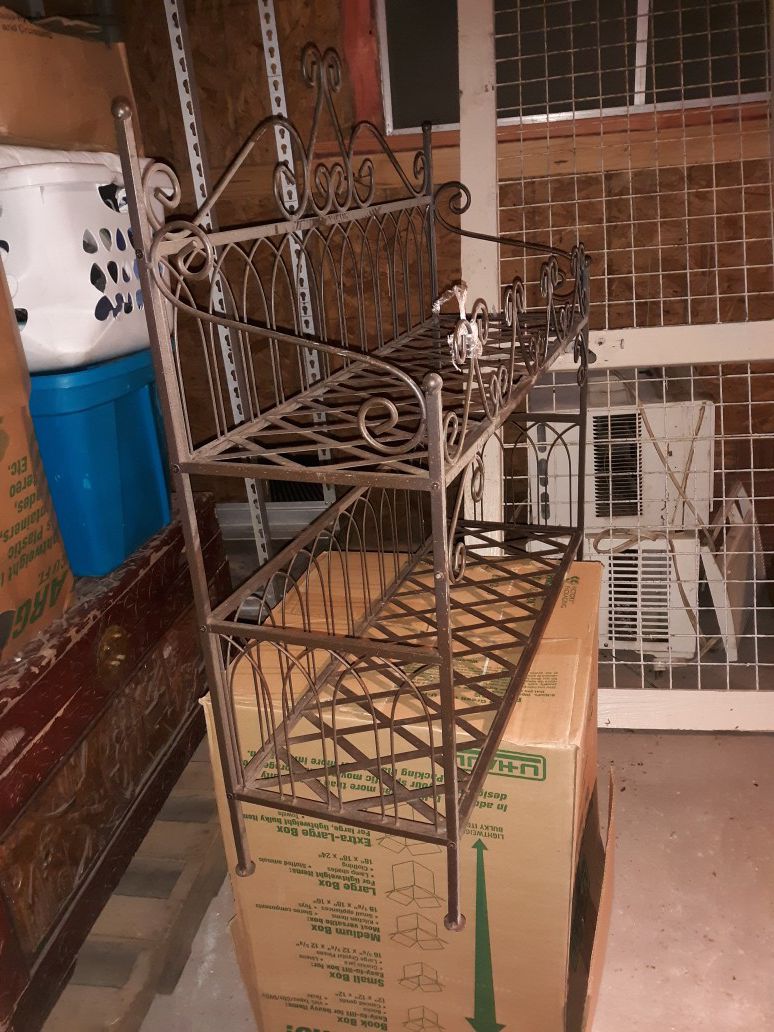Steel storage rack. Use for magazines, shoes, workout equipment. Very good storage rack.