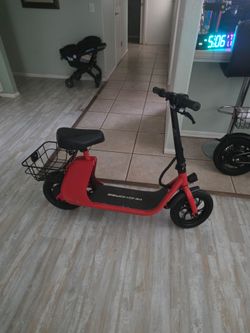 Electric sit down scooter 16mph 20miles distance  they fold down