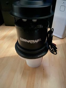 DynatrapxL  DT2000XL   Used. Can’t find net under it. And it needs the bulbs.