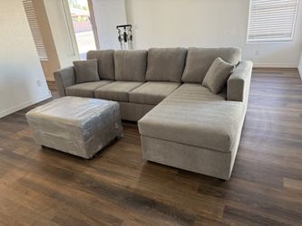 Brand New Grey Sectionals With Free Ottoman 