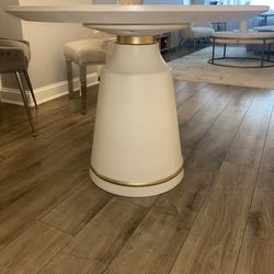 White with gold accent dining table