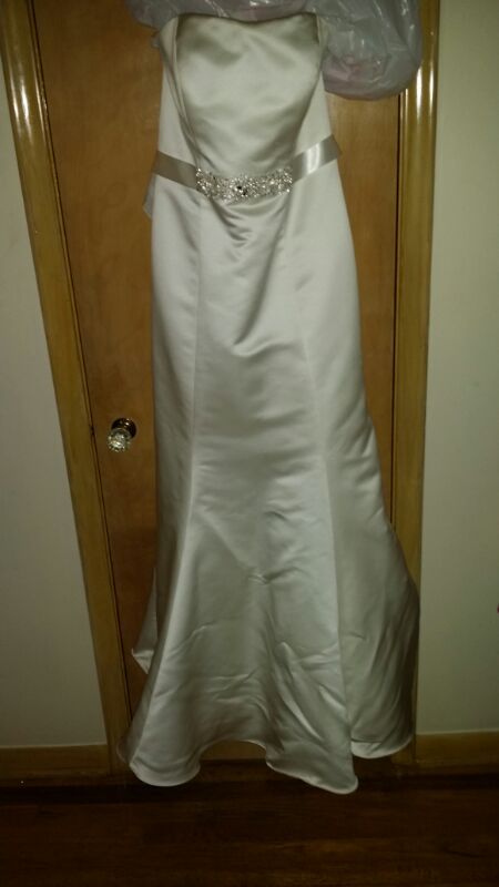 Beautiful wedding gown. Ivory, satin finish short train, size 14. Have a short jacket seperate !
