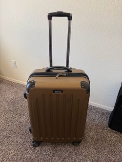 Kenneth Cole Reaction 24” Hardcase Rolling Luggage – Champagne Gold