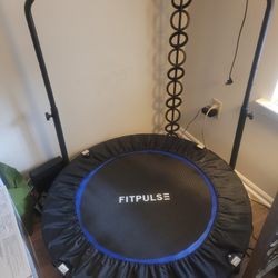 Trampoline w/holding bar