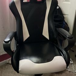 White & black Gaming chair.