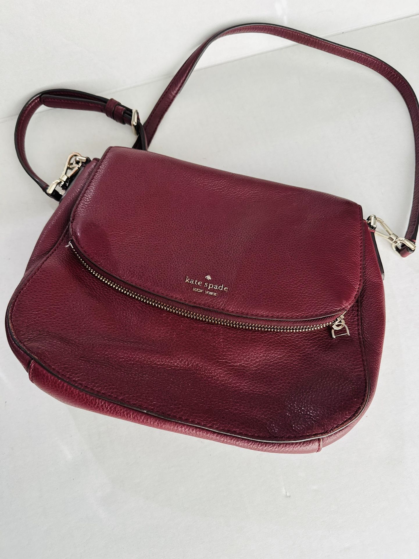 Kate Spade Pebble Leather Crossbody Strap has a little peeling on the edge
