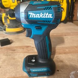 Makita 18V LXT Brushless 3-Speed Impact Driver (Model XDT14).