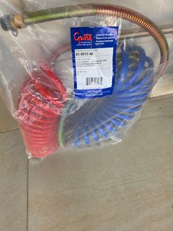 Blue and red tractor air hoses