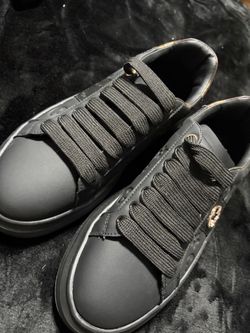 Black Leather Low-Top Sneakers with Gold Hardware