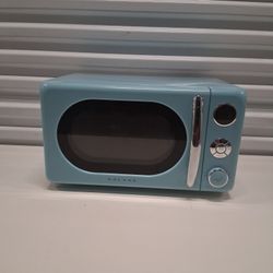 MICROWAVE :1.5FT LONG 8.5IN TALL  9.5WIDE