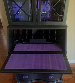 Antique Haunted Mansion theme desk with display