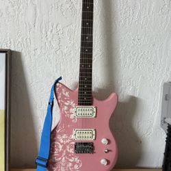 Pink Electric First Act guitar