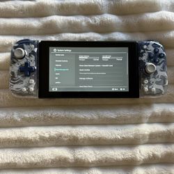 Nintendo Switch W/pokemon Joycons 