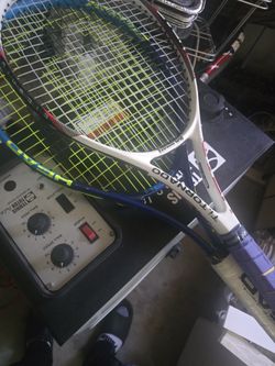 TENNIS MACHINEPLUS RACKTSBALL.