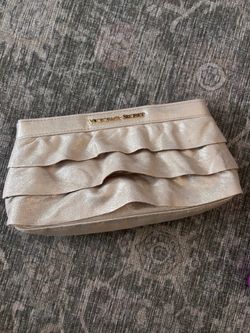 Victoria’s Secret gold ruffled clutch snap closure